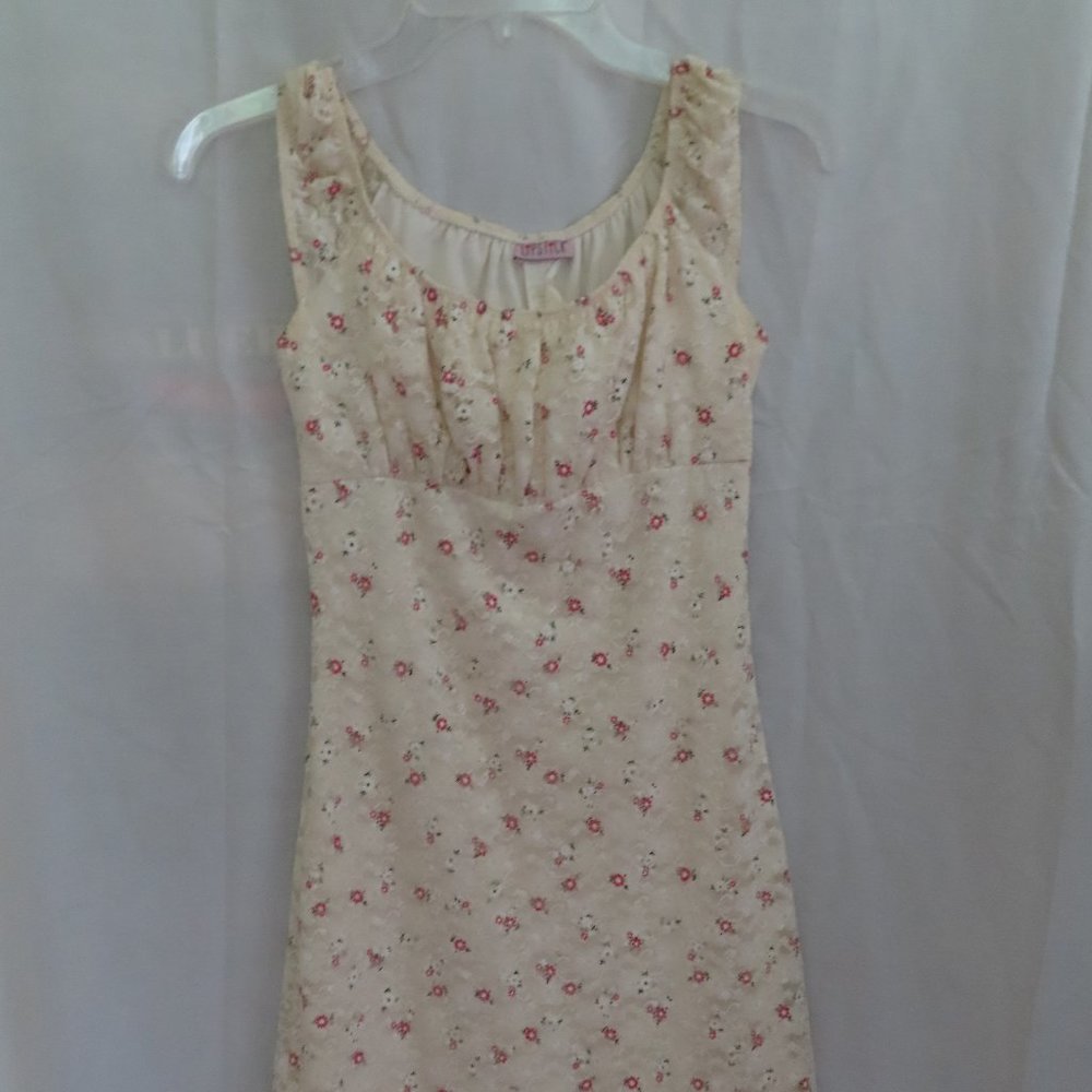 Knee length ivory flowered dress